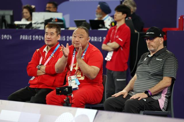 星空体育-张军总结国羽巴黎奥运会表现:两金刚及格,60-65分